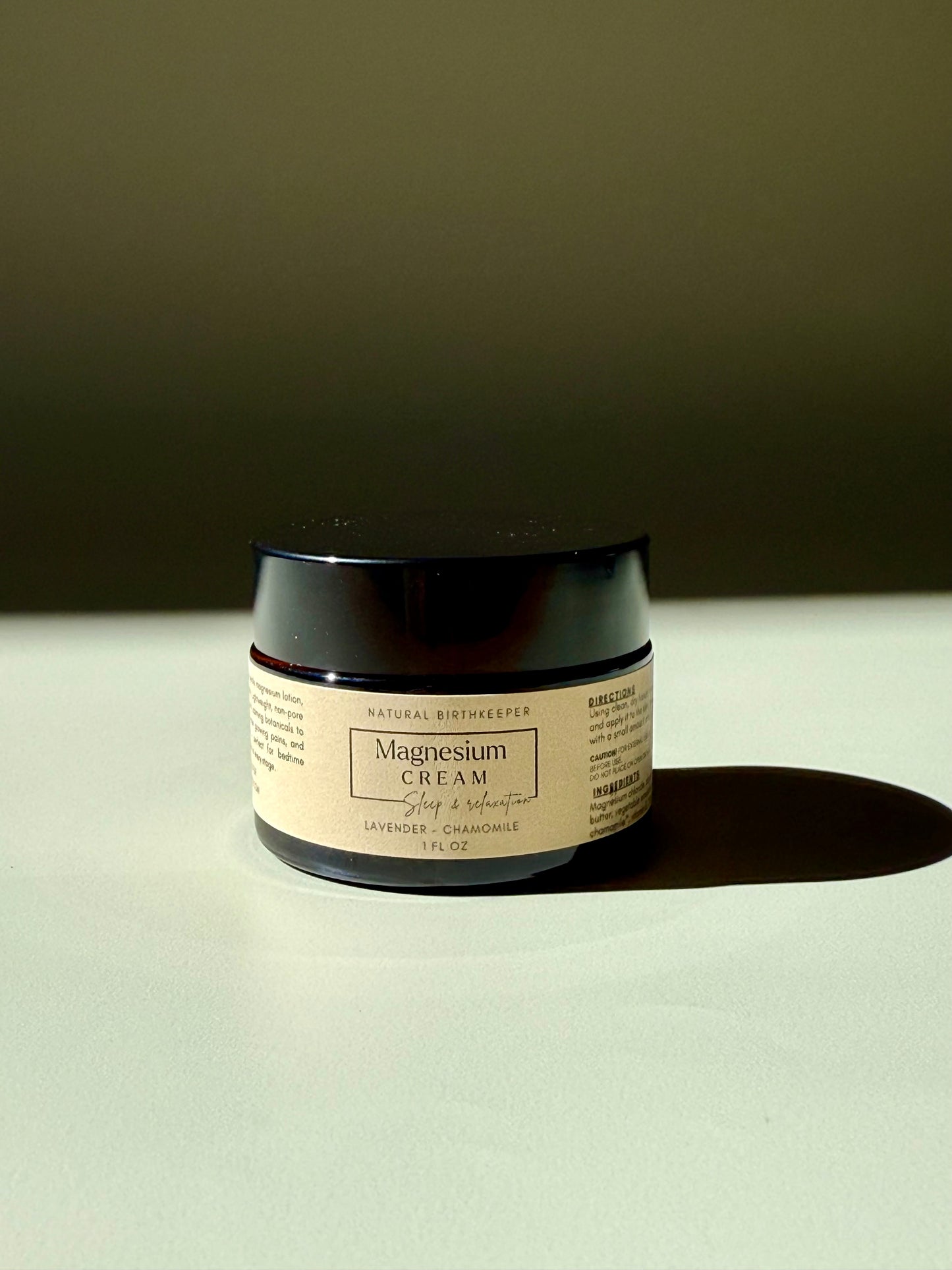 Organic herbal infused vegan magnesium cream. 1 oz amber jar.