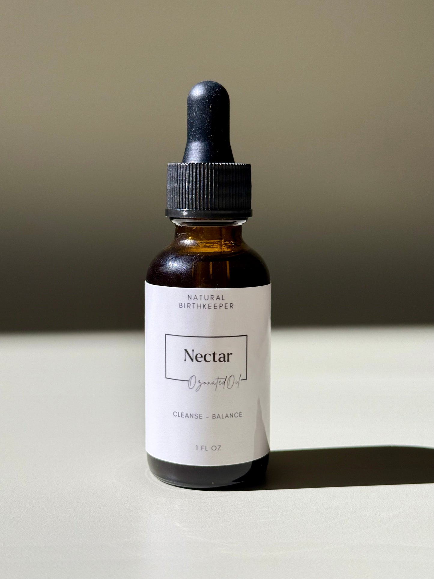 Organic ozonated cleansing oil or serum infused with herbs