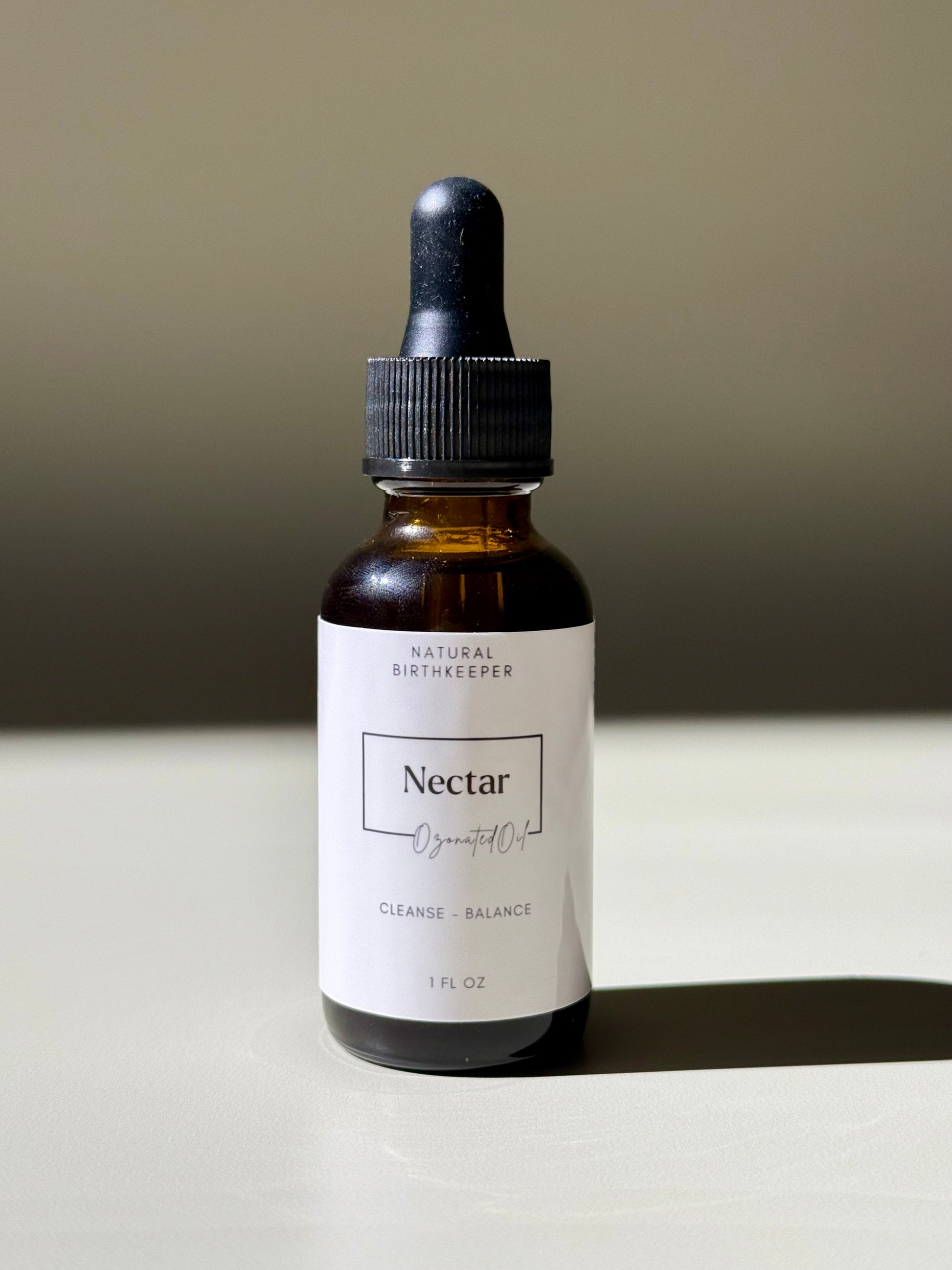 Organic ozonated cleansing oil or serum infused with herbs