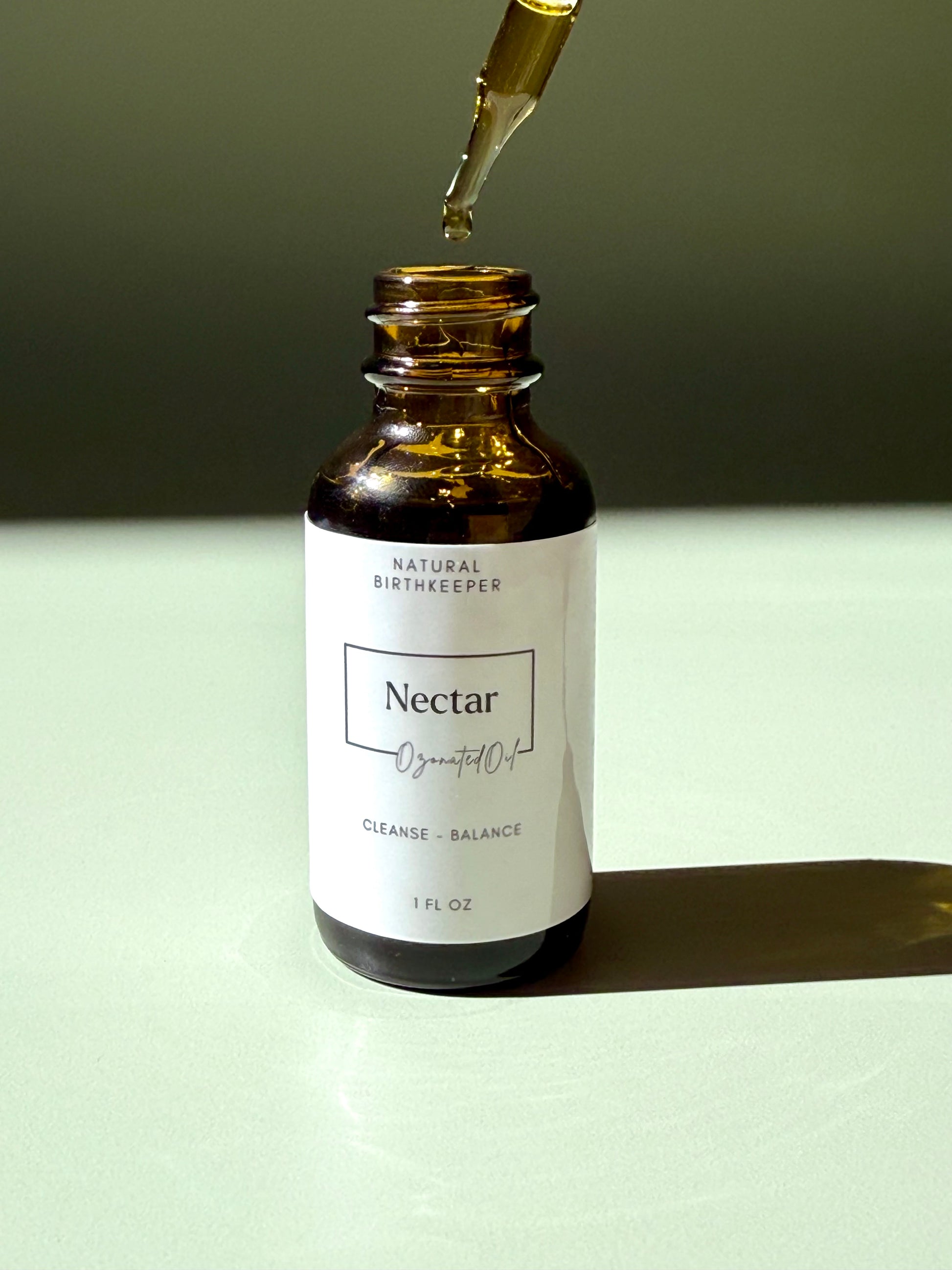 Organic ozonated cleansing oil or serum infused with herbs